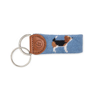 Load image into Gallery viewer, Needlepoint keychain featuring a beagle dog motif on blue fabric with leather tab and two silver rings