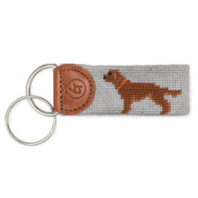 Load image into Gallery viewer, Needlepoint keychain featuring a chocolate Labrador dog on gray canvas with leather fob