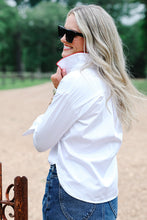 Load image into Gallery viewer, Model wearing white button-up shirt with red collar trim, back view, outdoors