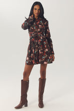 Load image into Gallery viewer, Model wearing long-sleeve floral mini shirtdress with drawstring waist and knee-high brown boots