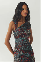 Load image into Gallery viewer, Model wearing ruched floral mesh midi dress with asymmetric neckline and sleeveless silhouette