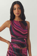 Load image into Gallery viewer, Model wearing sleeveless abstract swirl-print crop top with coordinating ruched skirt