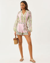 Load image into Gallery viewer, Model wearing a pink and green paisley printed romper with long sleeves and tie waist