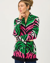 Load image into Gallery viewer, Model wearing a bold zebra-print open-front cardigan with fringe hem and belt detail
