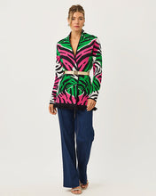 Load image into Gallery viewer, Model wearing a vibrant zebra-print jacquard cardigan with fringe hem and gold belt