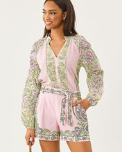 Load image into Gallery viewer, Model wearing long-sleeve romper with ornate paisley print and tie waist