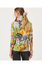 Load image into Gallery viewer, Back view of model wearing vibrant multicolor animal print pullover with long sleeves