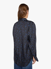 Load image into Gallery viewer, Back view of oversized button-down shirt featuring scattered star print on dark background