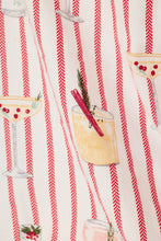 Load image into Gallery viewer, Close-up detail of holiday cocktail and red stripe print fabric from P.J. Salvage pajama shorts