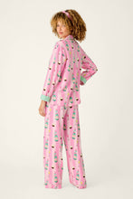 Load image into Gallery viewer, Model wearing pink striped pajama set with champagne and cupcake print, back view