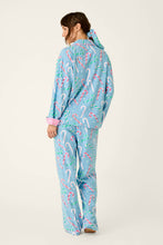 Load image into Gallery viewer, Back view of woman wearing candy cane print pajama set with long sleeves and pants