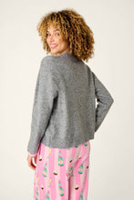 Load image into Gallery viewer, Back view of model wearing grey knit pullover with pink champagne-print wide-leg pants
