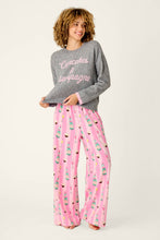 Load image into Gallery viewer, Model wearing grey long sleeve pullover with Cupcakes and Champagne script and pink printed pants