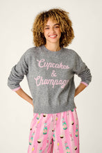 Load image into Gallery viewer, Model wearing grey knit pullover sweater with pink Cupcakes and Champagne script lettering