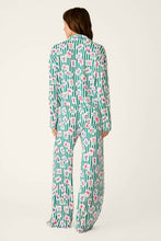 Load image into Gallery viewer, Back view of model wearing green striped mahjong-print long sleeve pajama set