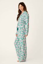 Load image into Gallery viewer, Model wearing long sleeve button-front pajama set with green stripe and mahjong tile print