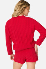 Load image into Gallery viewer, Back view of woman wearing red cable knit sweater and matching shorts set