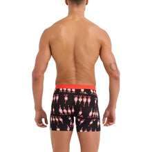 Load image into Gallery viewer, Back view of men's boxer briefs with festive gnome print and red waistband on male model