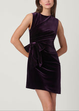 Load image into Gallery viewer, Sleeveless velvet mini dress with side bow detail and crew neckline on model