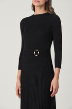 Load image into Gallery viewer, Close-up of ribbed knit midi dress with three-quarter sleeves and gold tortoiseshell belt buckle
