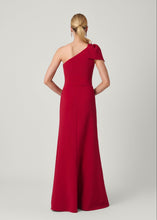 Load image into Gallery viewer, Back view of one-shoulder floor-length gown with bow detail on left shoulder