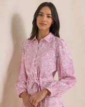 Load image into Gallery viewer, Model wearing a long-sleeve belted mini shirtdress with floral botanical print and collar