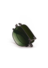 Load image into Gallery viewer, Folded round sunglasses with dark gunmetal frames and green tinted lenses collapsed compact