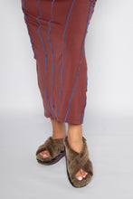Load image into Gallery viewer, Close-up of furry crossband platform sandals worn with a striped midi dress