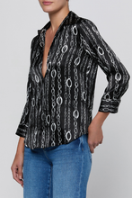 Load image into Gallery viewer, Model wearing black satin blouse with silver chain link print and three-quarter sleeves